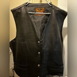 Milwaukee Leather Men’s leather vest and chaps.
